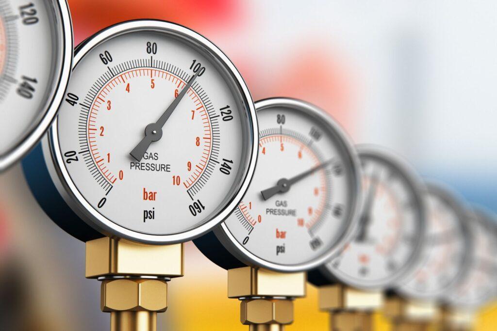 row of industrial manometers row of industrial manometers