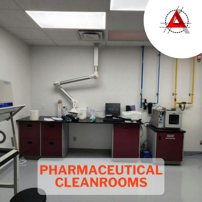 Pharmaceutical cleanroom laboratory with workbench, ventilation arm, and ceiling HEPA lighting panels.