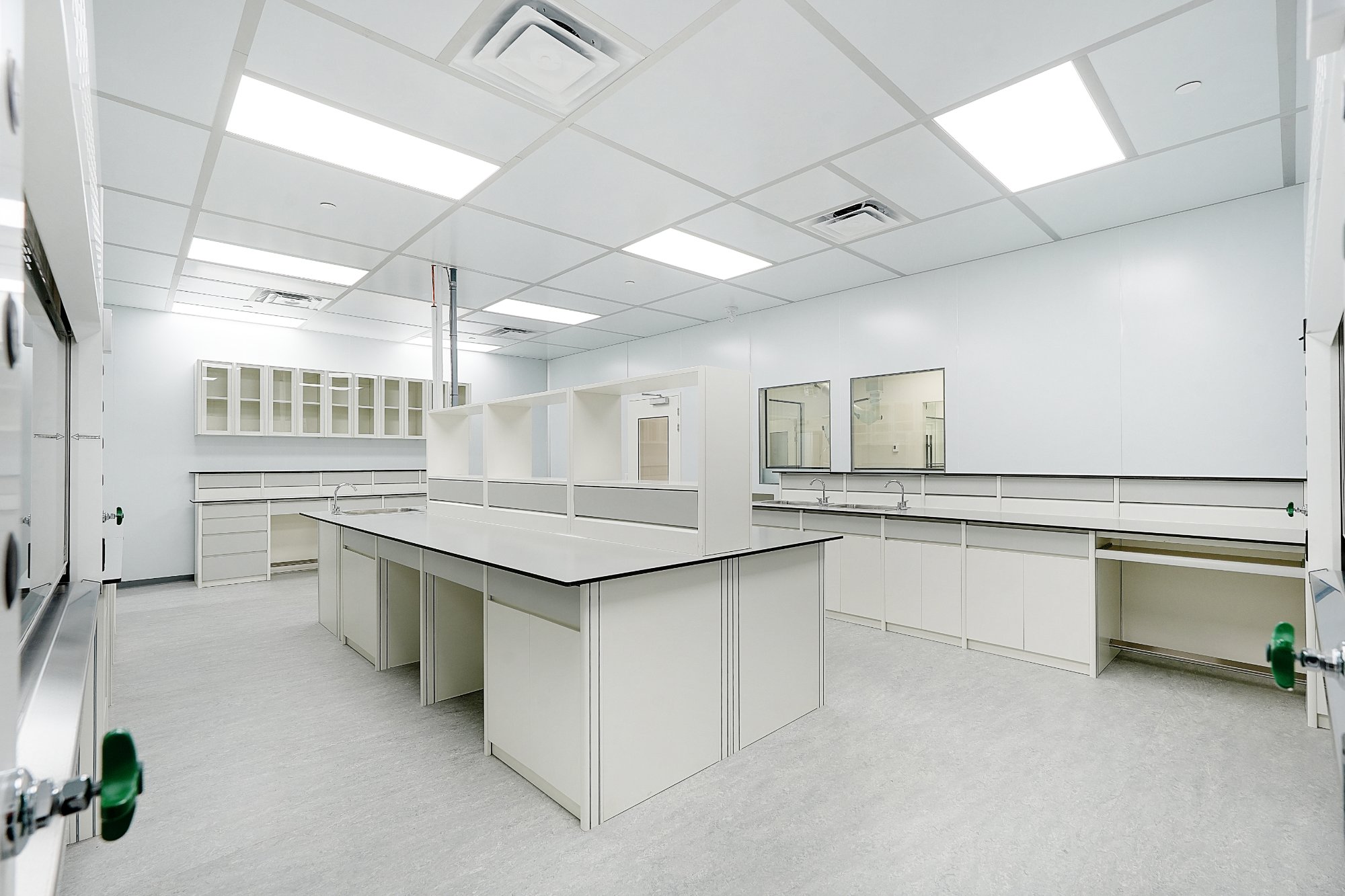 Dry room manufacturer Canada — ACH Solutions completed pharmaceutical laboratory with island benches