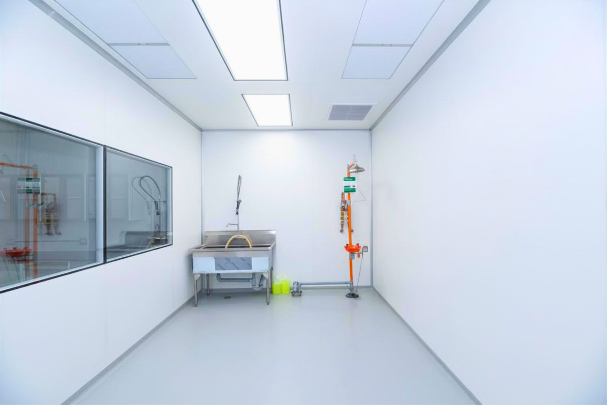 ISO 8 cleanroom wash-up room built by ACH Engineering — example of a project sized by our cleanroom cost calculator