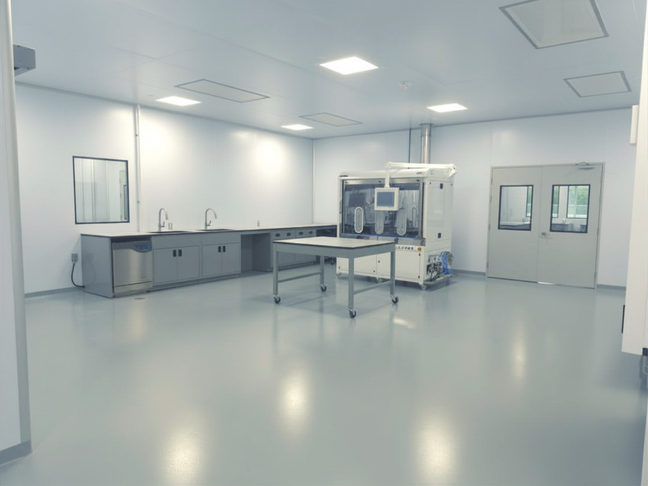 Pre-fit-out controlled environment shell with vapour-sealed wall construction