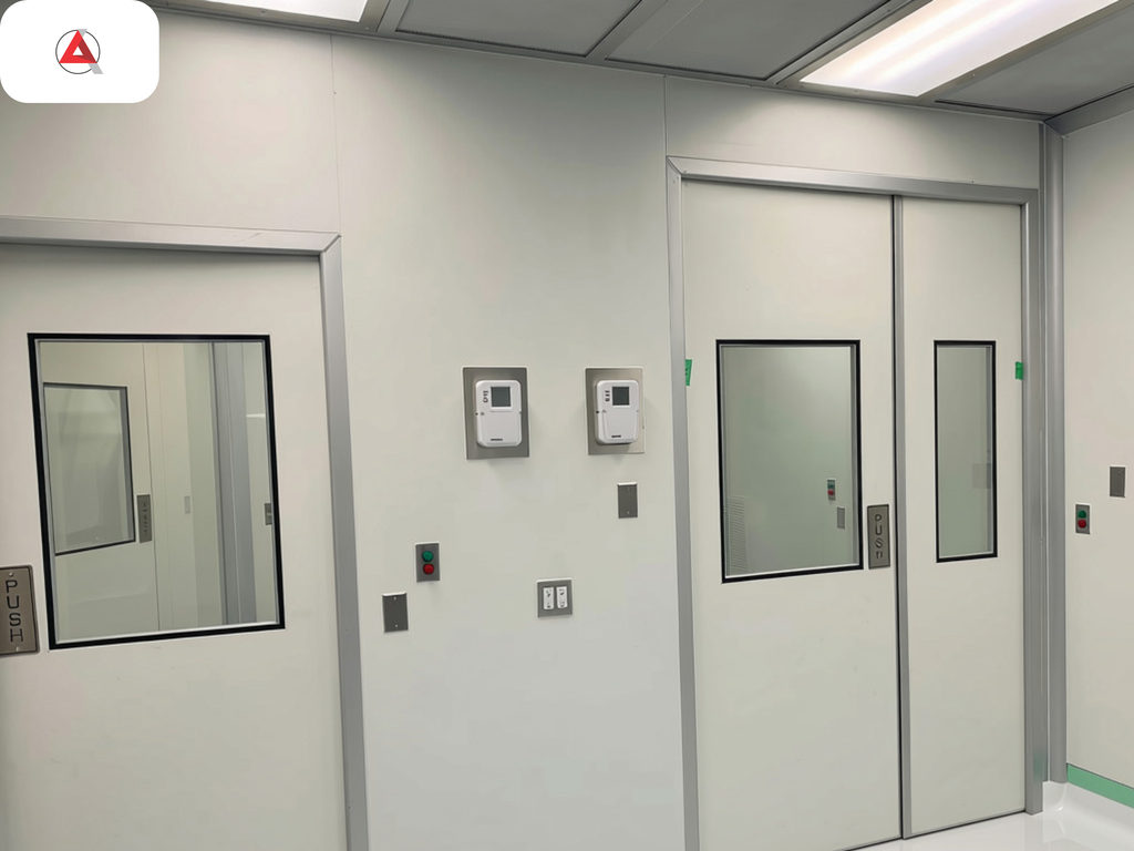 Modular cleanroom personnel airlock (PAL) and material airlock (MAL) entrance suite with interlocked doors