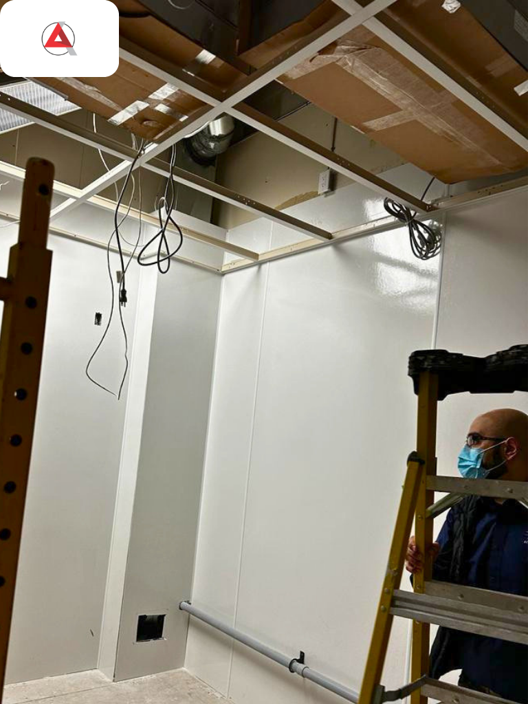 Framing and panel assembly for a NAPRA compliant modular cleanroom retrofit by ACH Engineering
