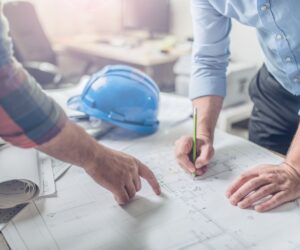 engineers discussing cleanroom building plans