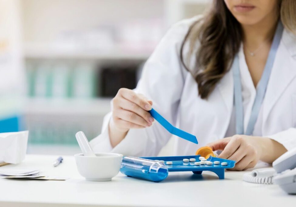 pharmacist preparing medication