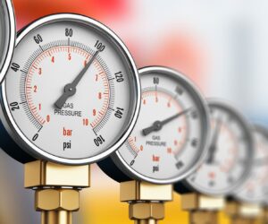 row of industrial manometers