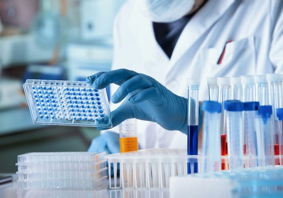 scientist working in biotech cleanroom