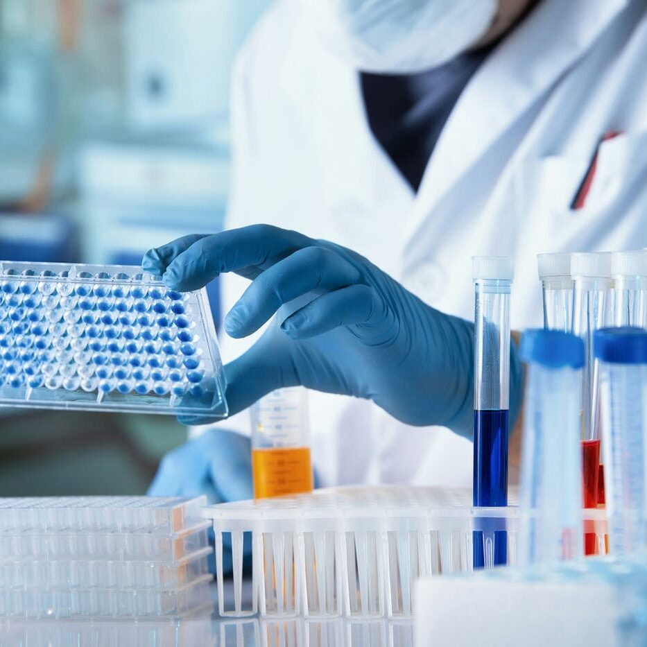 scientist working in biotech cleanroom